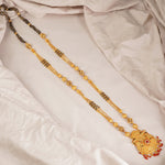 a photo of one gram gold mangalsutra with meena filled pendant