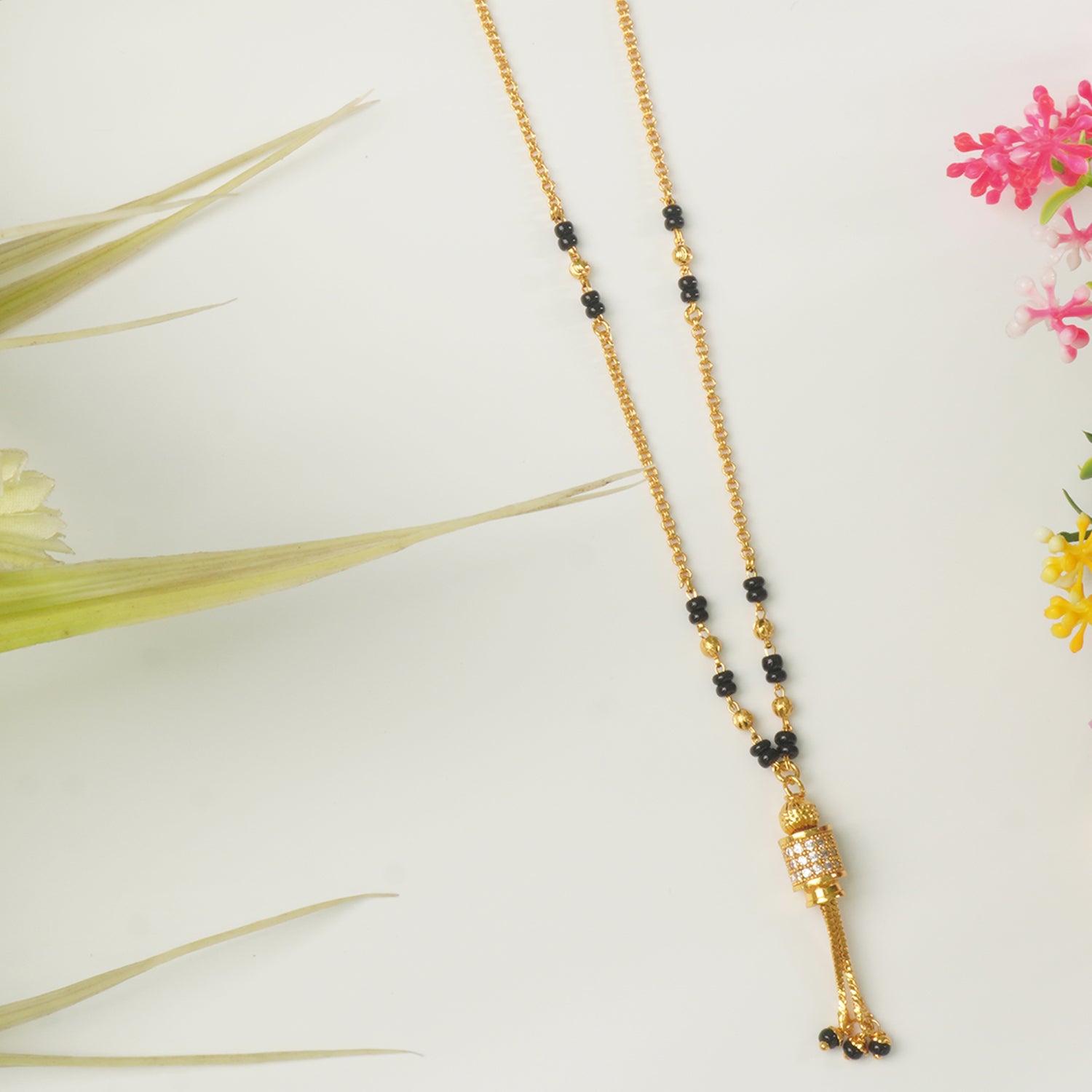 Short Jhalar Forming Mangalsutra Designs Online With Ad Pendant