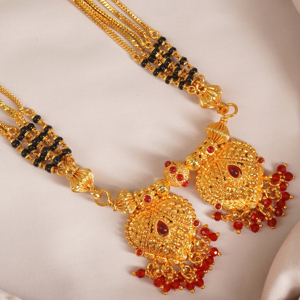 a close lookup of 1 gram gold vati pendant design with price.