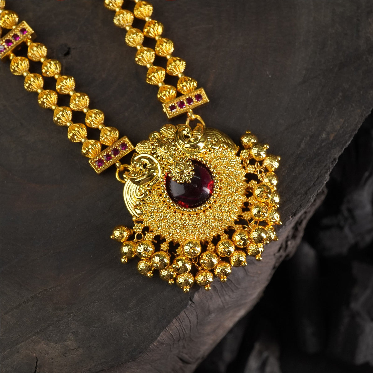 kolhapuri gold plated necklace with a peacock pendant