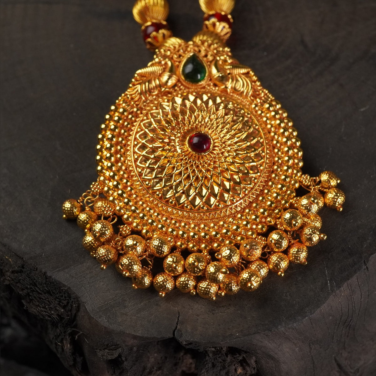 gold gheru pendant