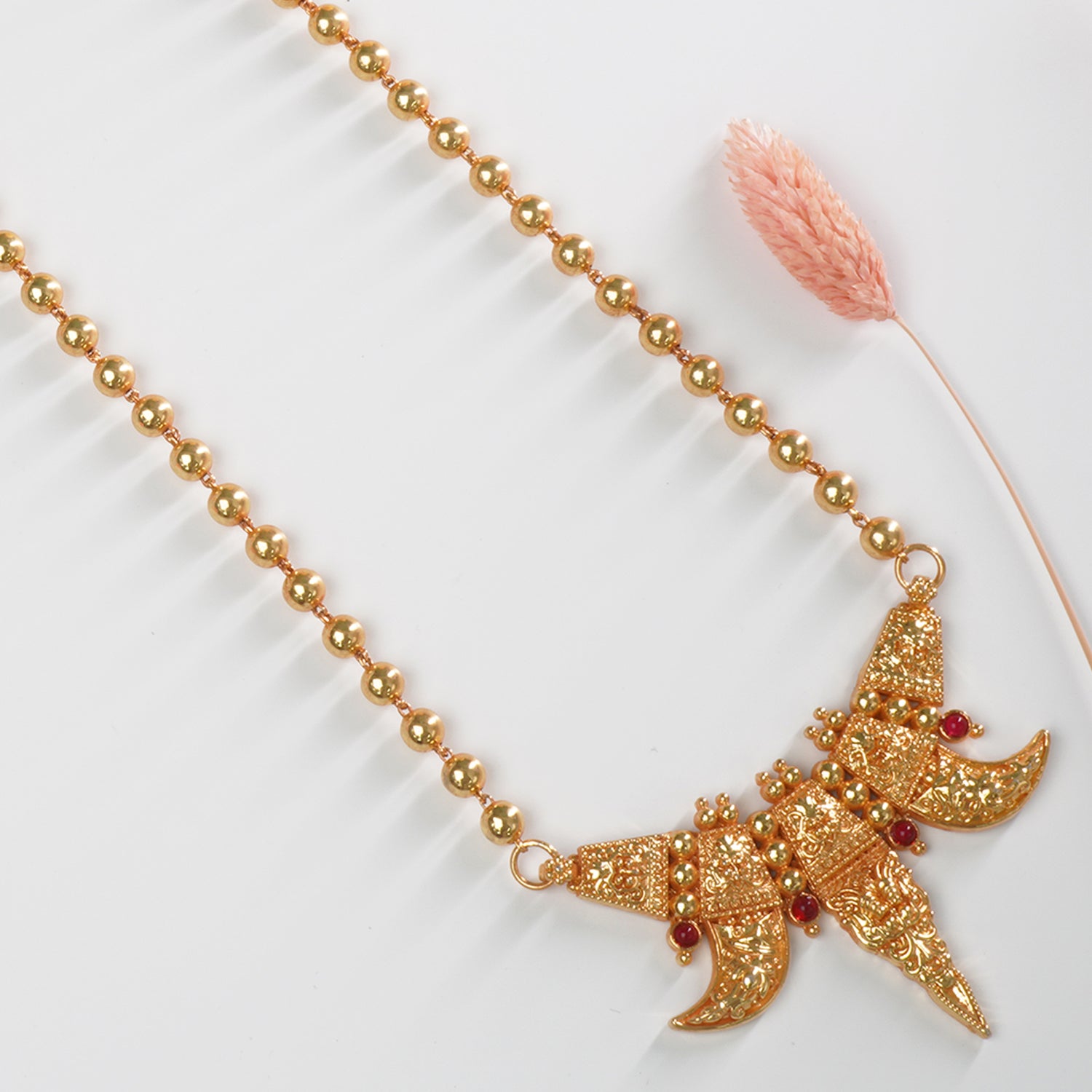 Shop Long Gold Plated Gheru Finish Beads Necklace With Gold Look-a-like Waghnakhi Pendant