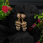 gold plated long moti jhumkas