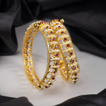 regal moti bangles with pearls and red stones