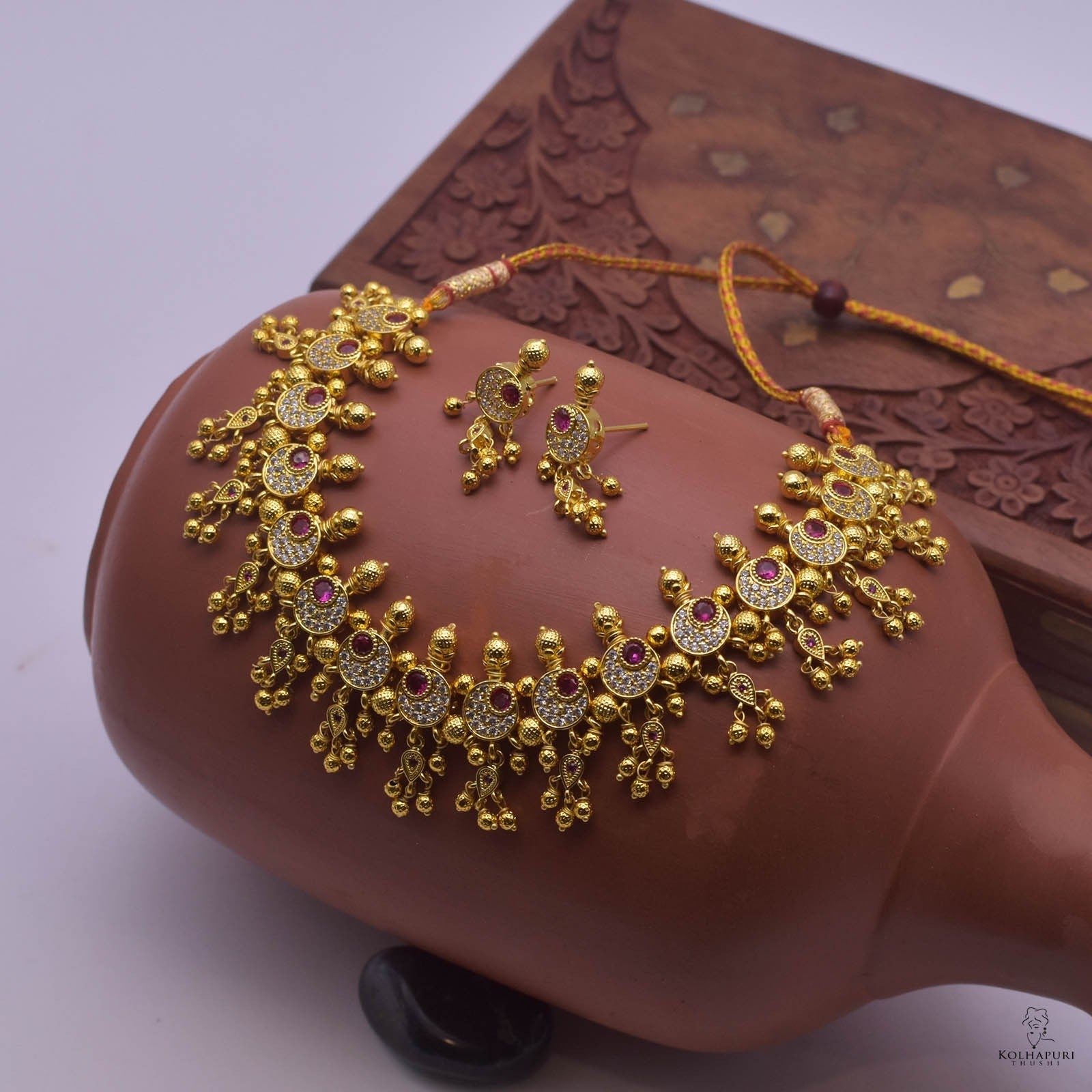 stone studded kolhapuri choker necklace design