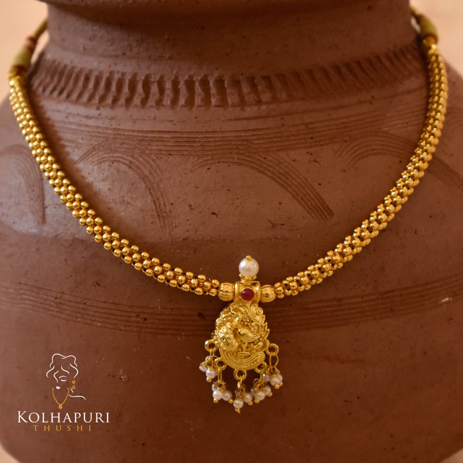 Kolhapuri Thushi Guttapusalu peacock pendal