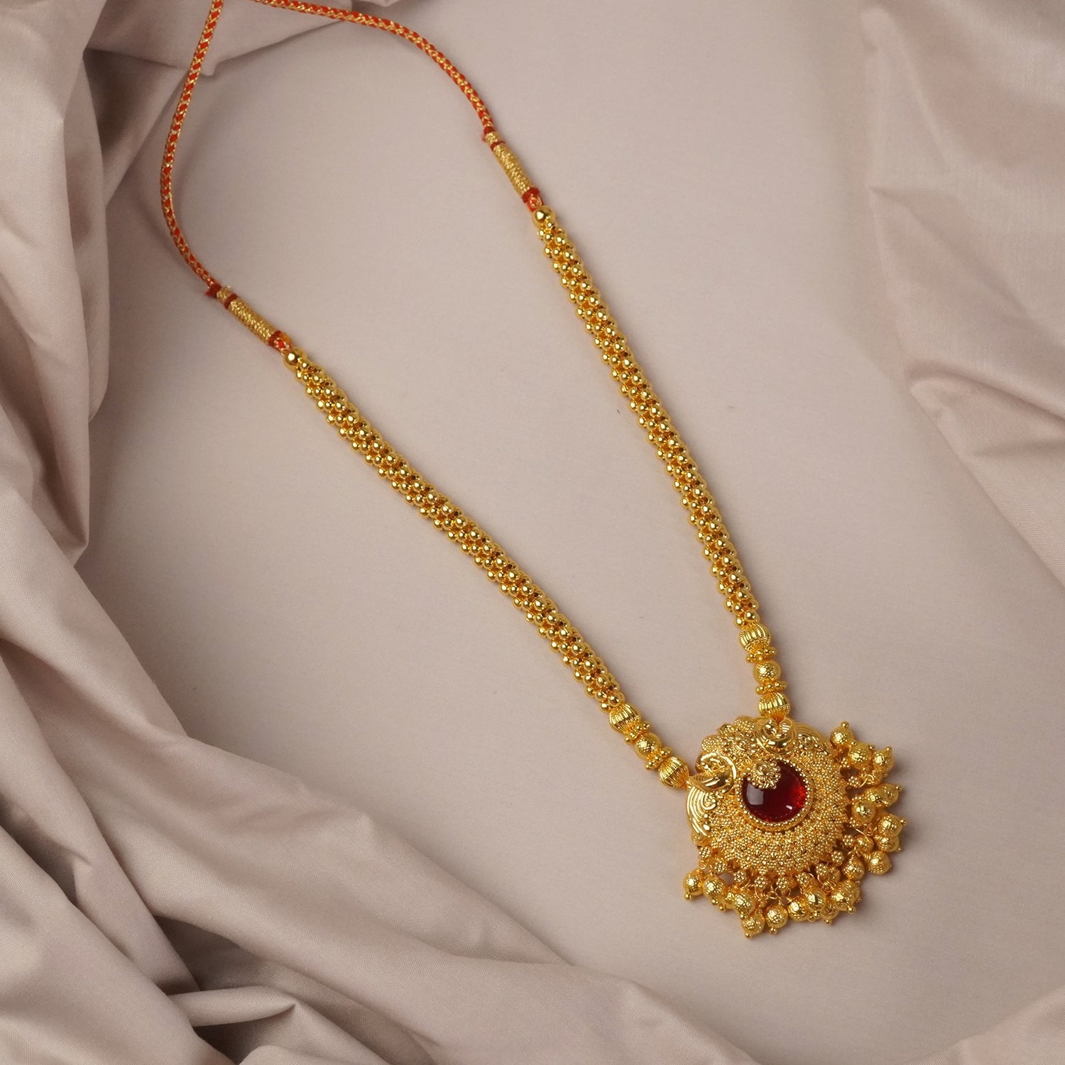 Broad Kolhapuri Thushi Peacock Pendant