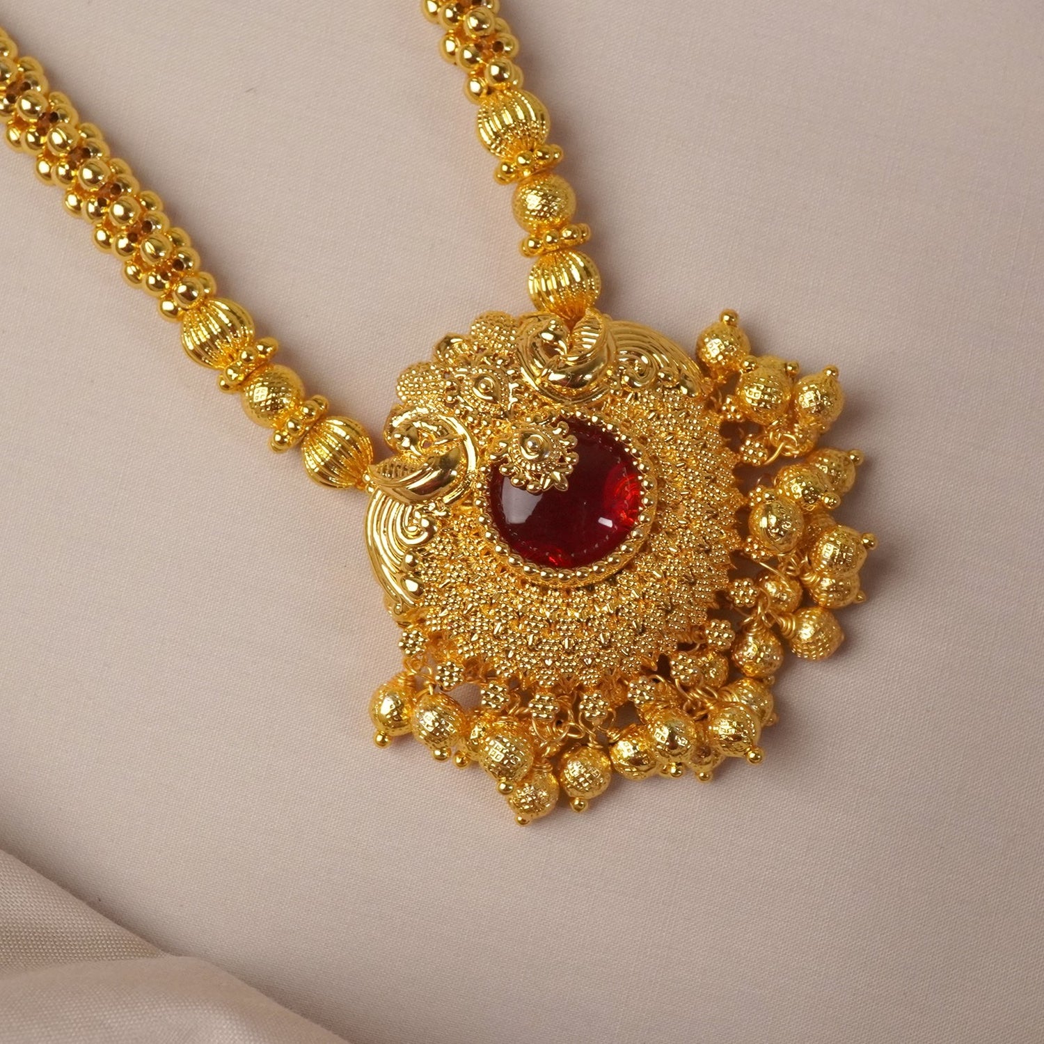 Broad Kolhapuri Thushi Peacock Pendant