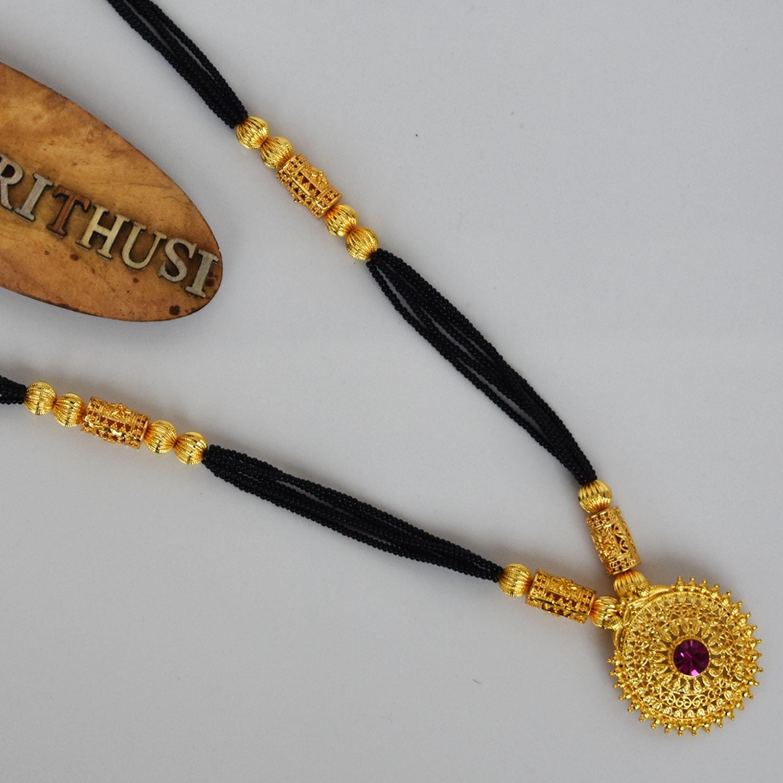 Manchali Long Pipe Design Rava Peacock Pendal