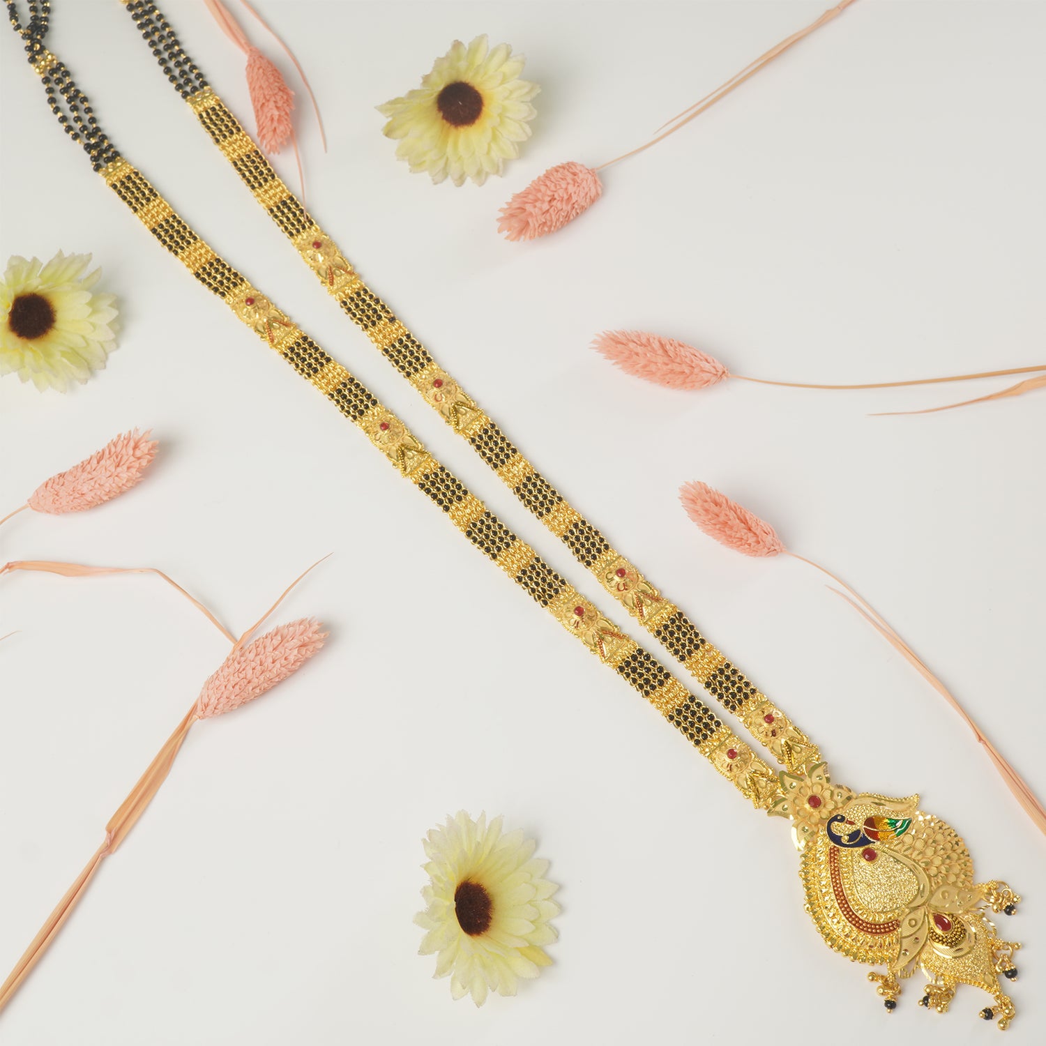 Shop Forming Gold Plated 36 Inches Long Patti Design Mangalsutra With Peacock Pendant
