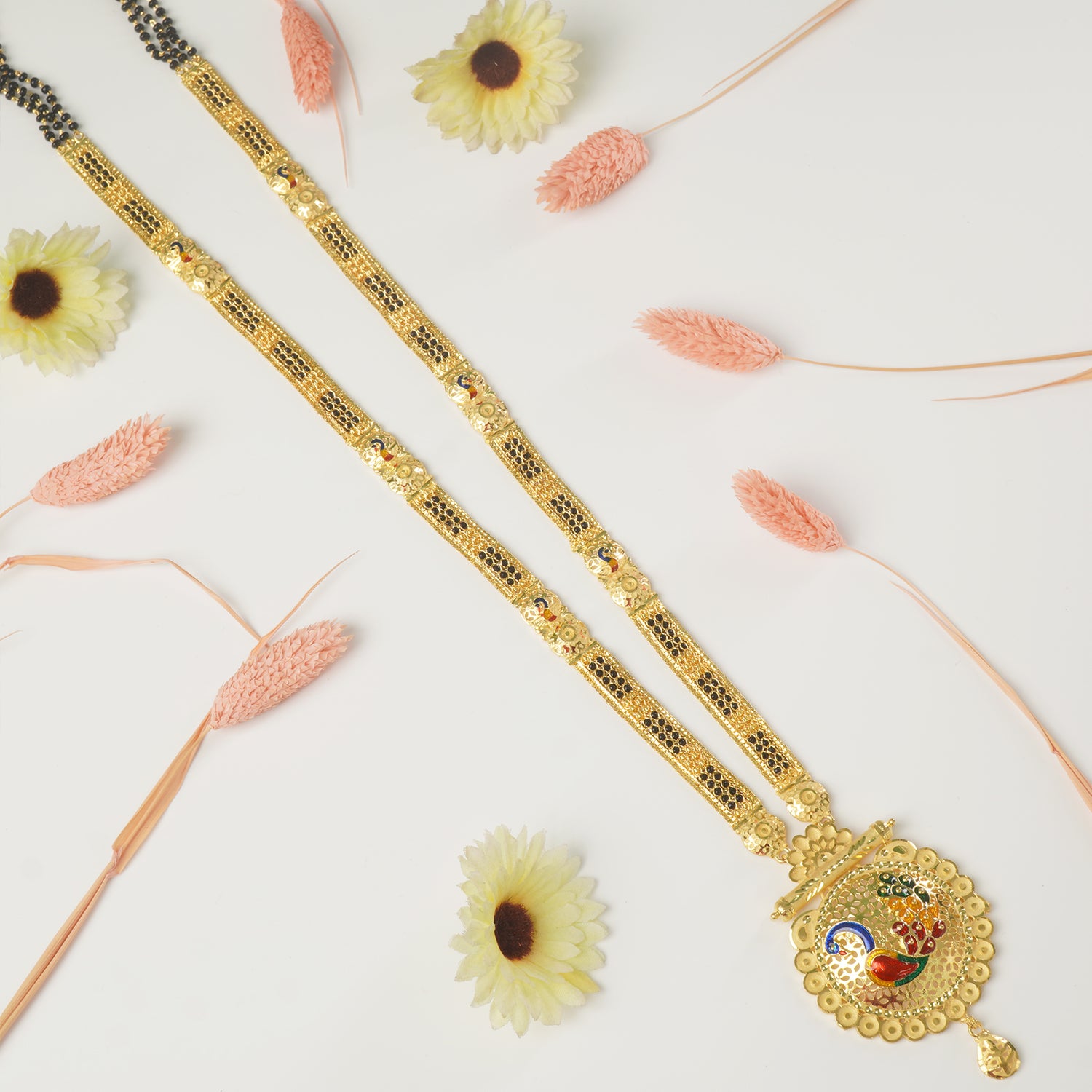 Shop Forming Gold Plated 36 Inches Long Patti Design Mangalsutra With Peacock Pendant Design
