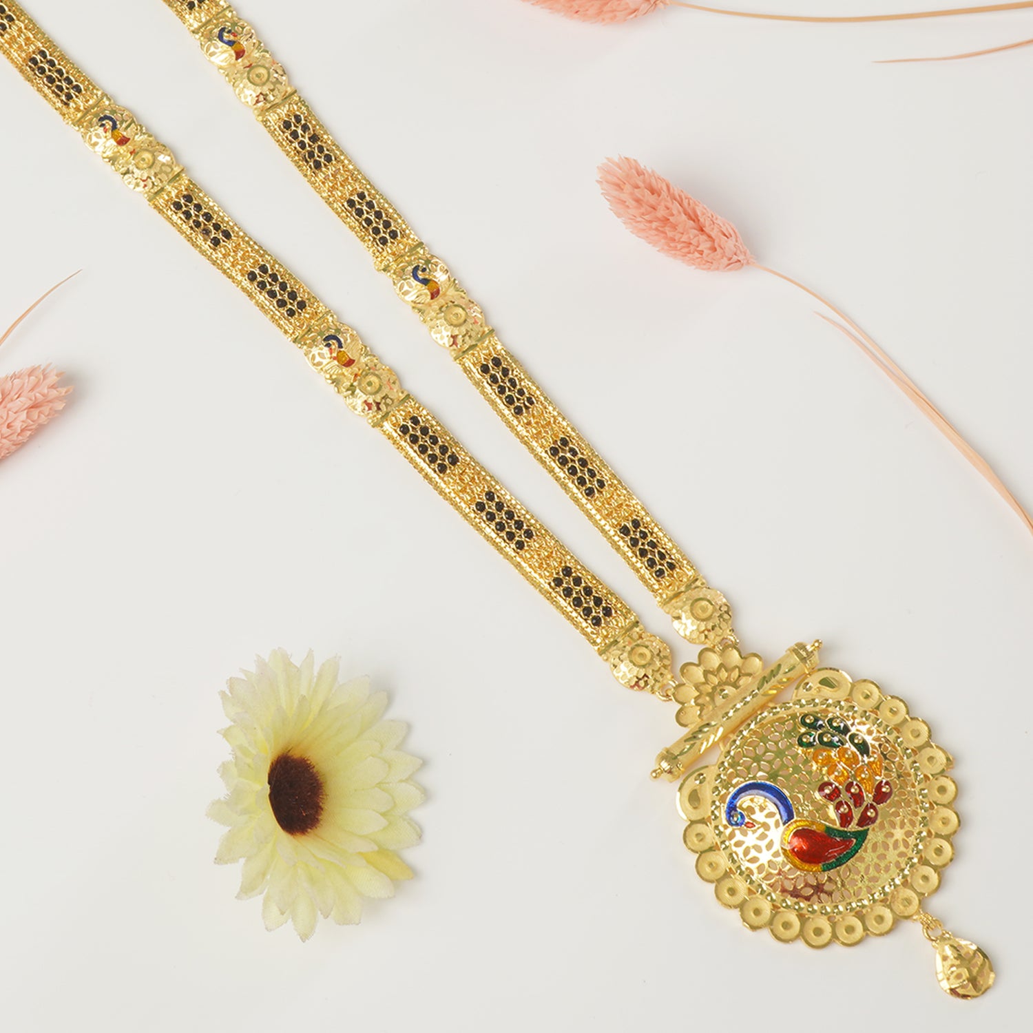 Shop Forming Gold Plated 36 Inches Long Patti Design Mangalsutra With Peacock Pendant Design