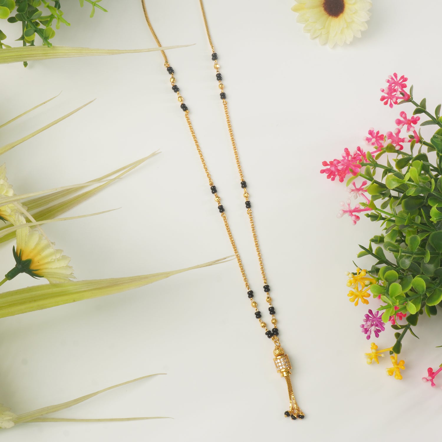 Short Jhalar Forming Mangalsutra Designs Online With Ad Pendant