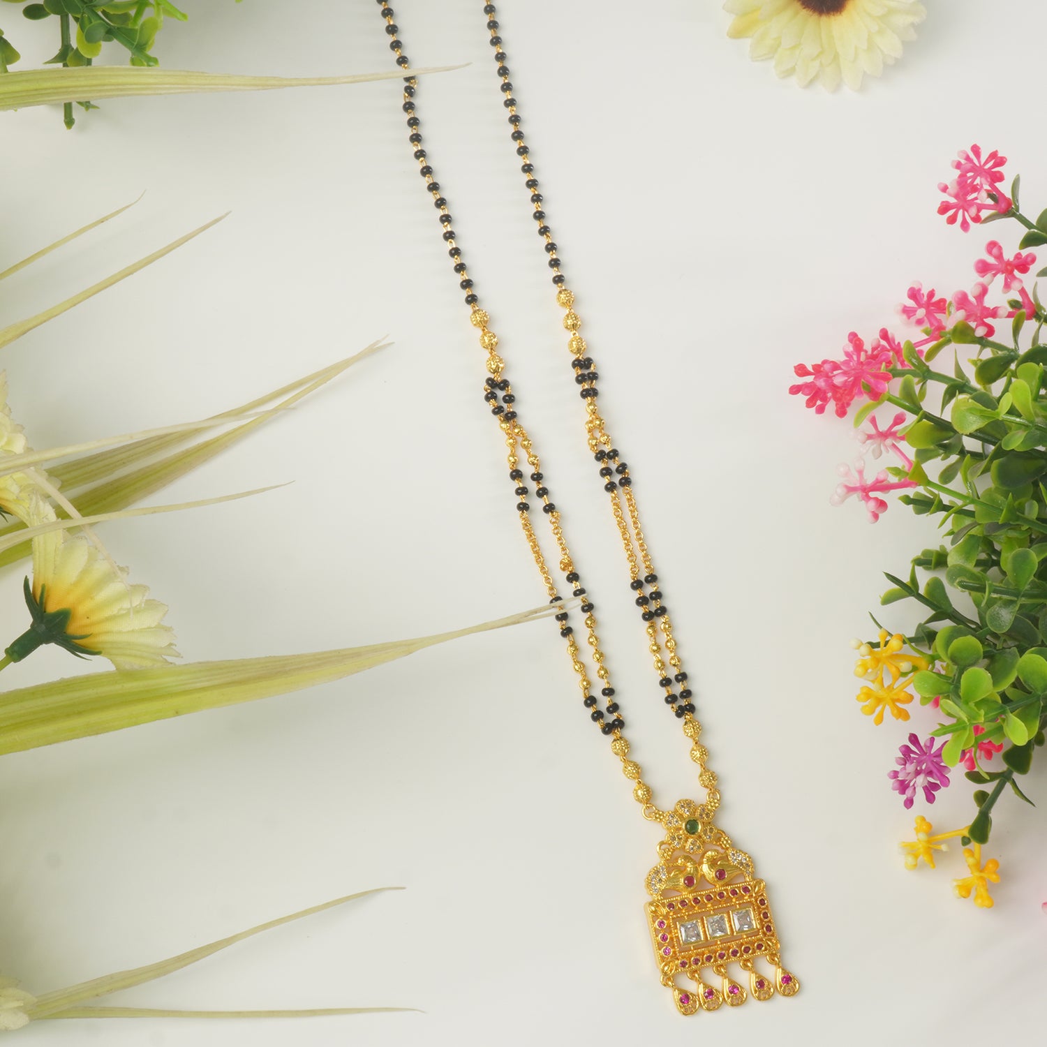 Short Forming Design Online With Chokda Pendant Studded With Ad Stones