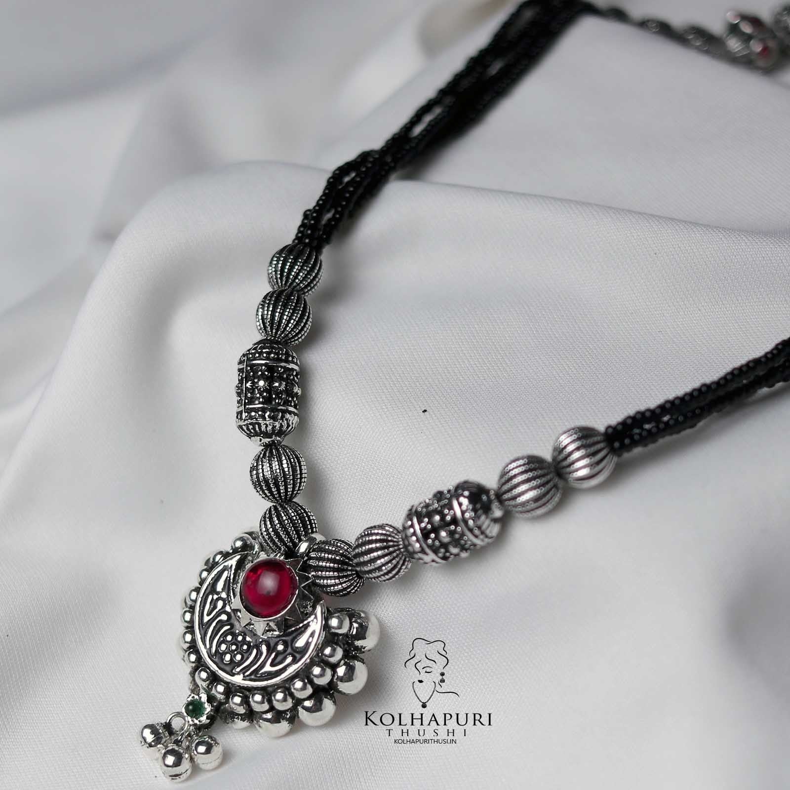 Oxidized coconut long chand pendant