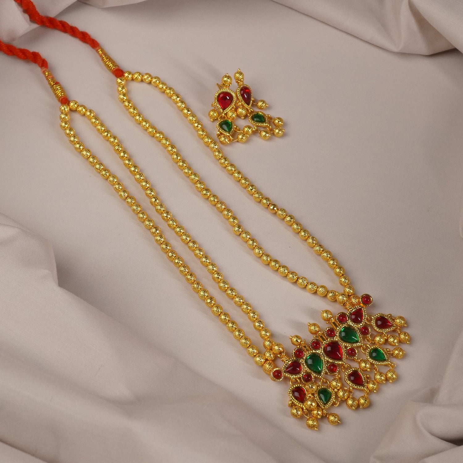 gold plated tanmani design.