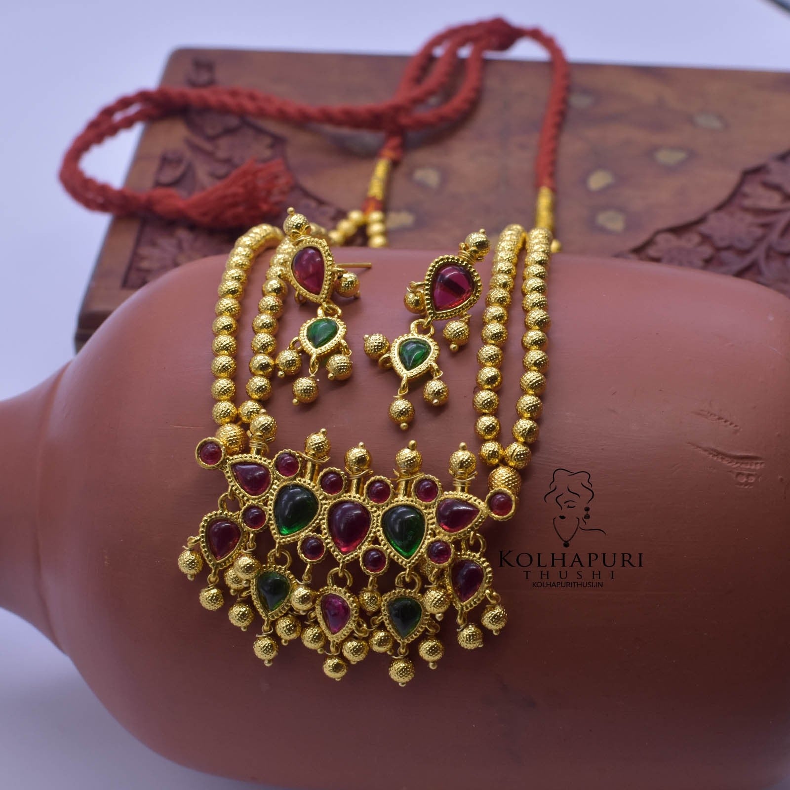 traditional gold tanmani necklace design