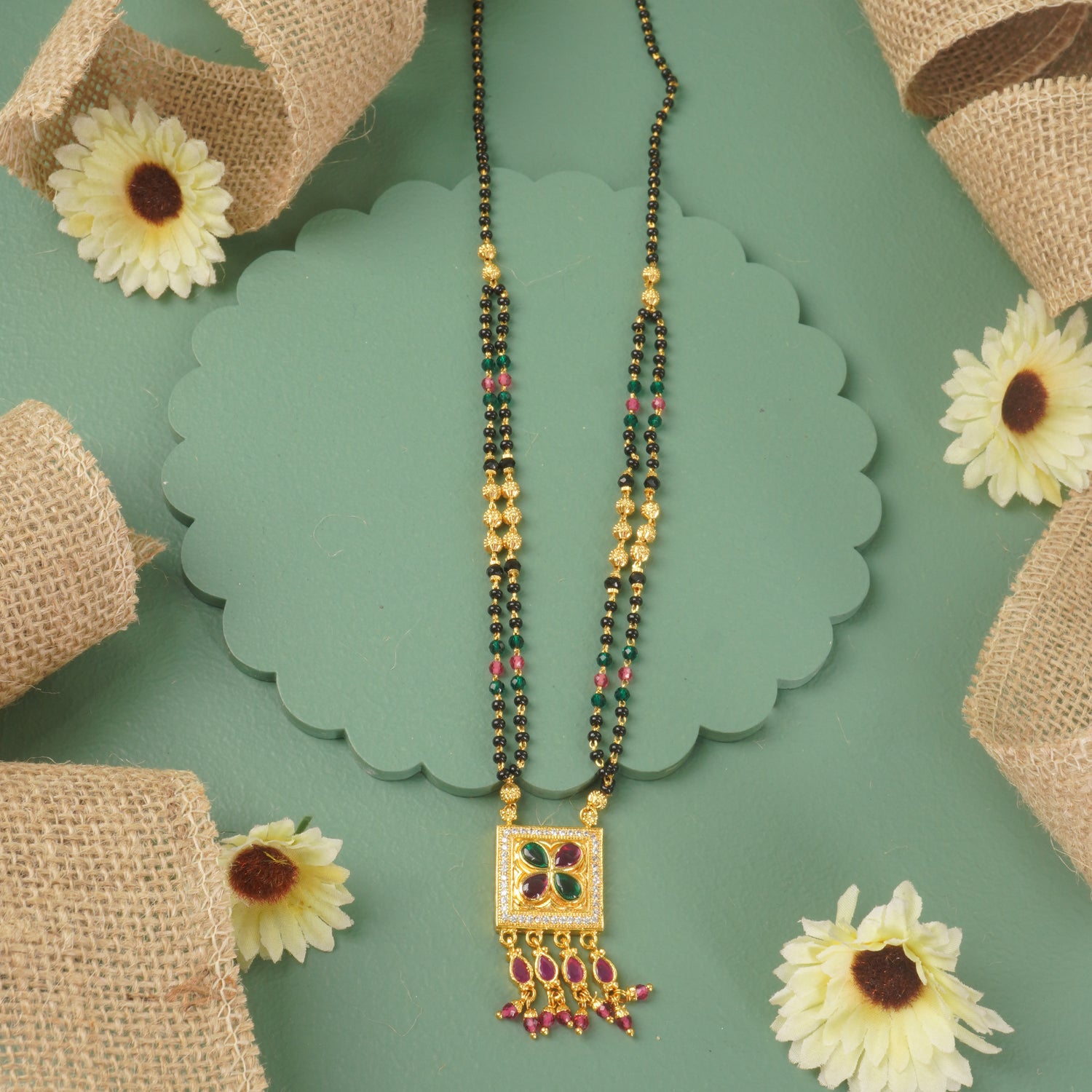 Short Forming Mangalsutra Design With Premium Quality Stone Studded Pendant