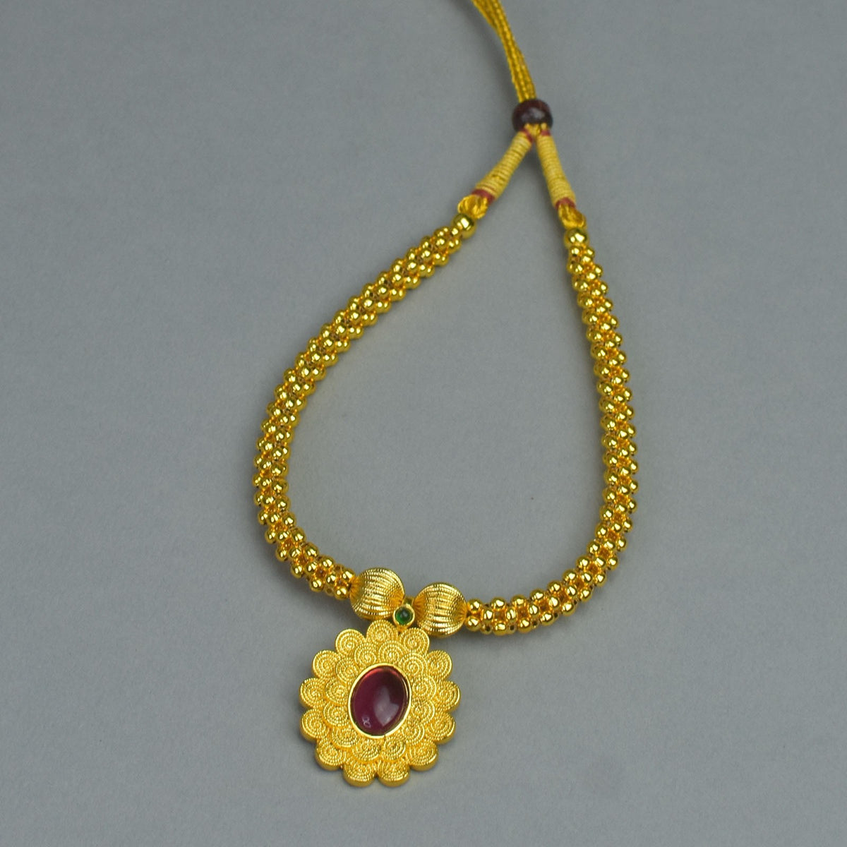 Kolhapuri Thushi design with jalebi shaped pendant