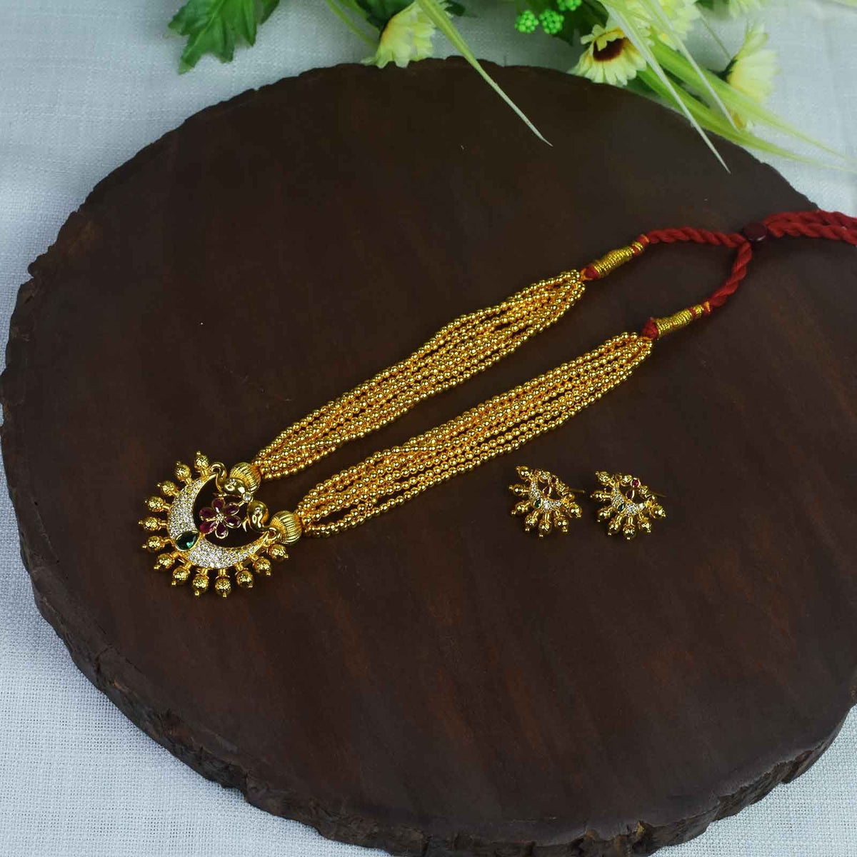 kolhapuri jondhali pot thushi with hati pendant and matching earrings