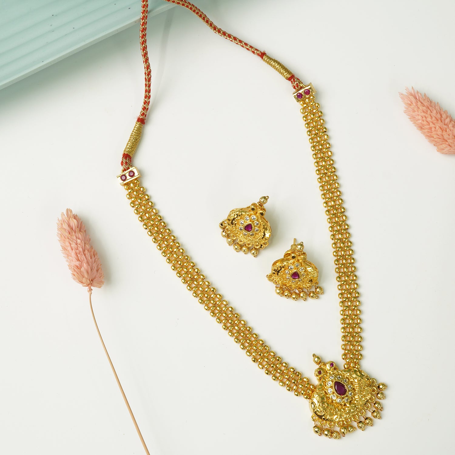 Premium Kolhapuri Thushi With Peacock Pendant And Earrings