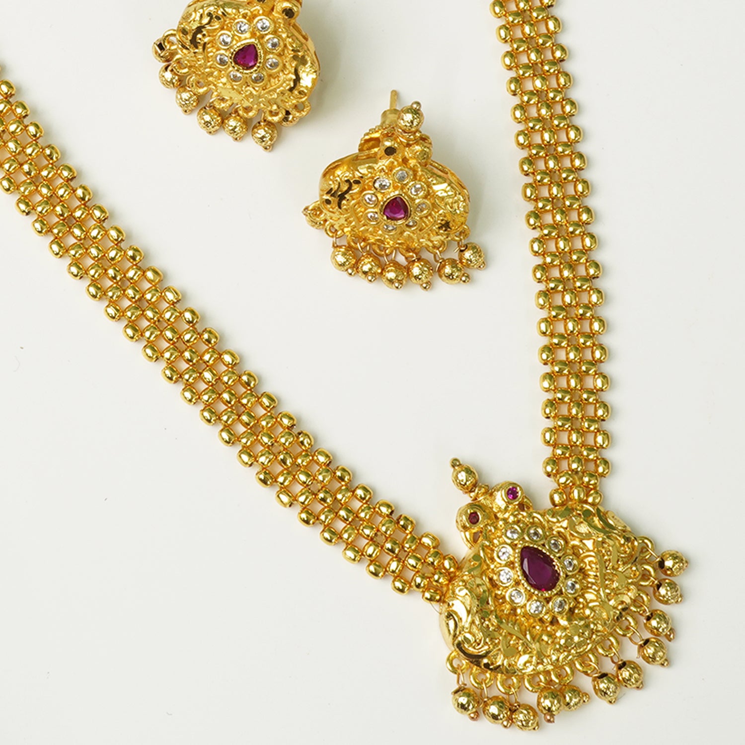 Premium Kolhapuri Thushi With Peacock Pendant And Earrings