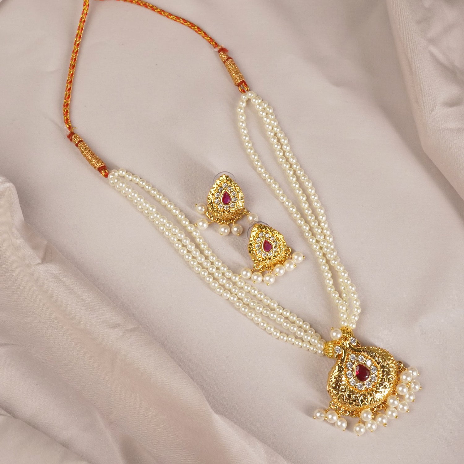 Traditional Moti Mala Design With Peacock Pendant And Earrings